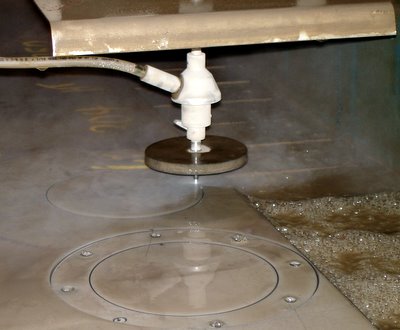 MultiCam water-jet cutting stainless flanges from 5/8